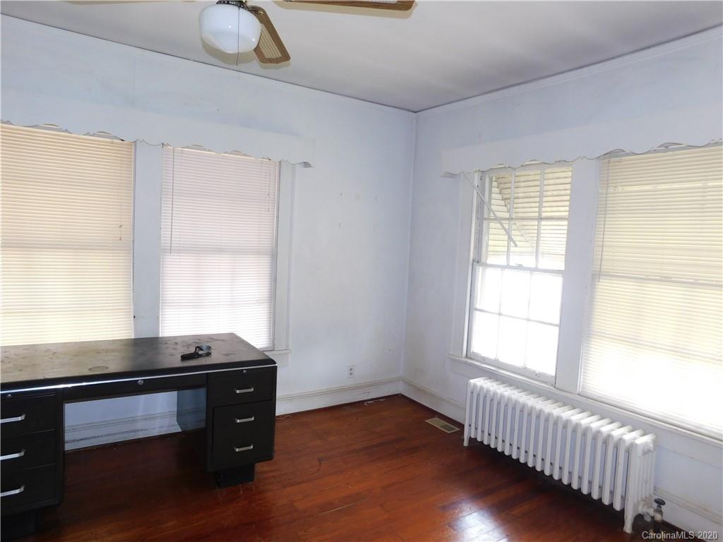 1382 Springdale Road, Unit 7 Lancaster, SC 29720 - Photo 24 of 31 a room with wooden floor and a window