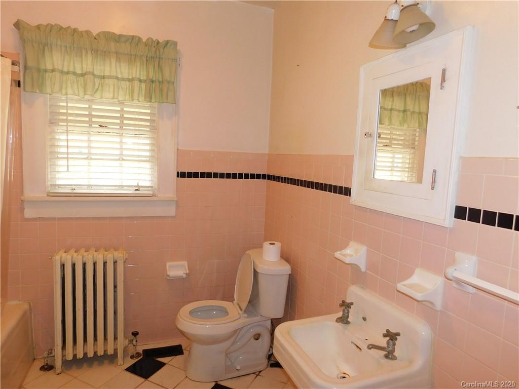 1382 Springdale Road, Unit 7 Lancaster, SC 29720 - Photo 28 of 31 a bathroom with a sink toilet and shower