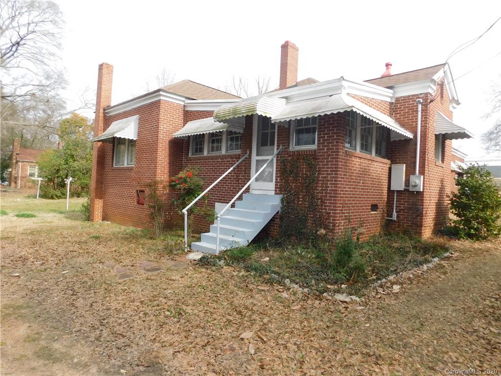 1382 Springdale Road, Unit 7 Lancaster, SC 29720 - Photo 30 of 31 a front view of a house with a yard