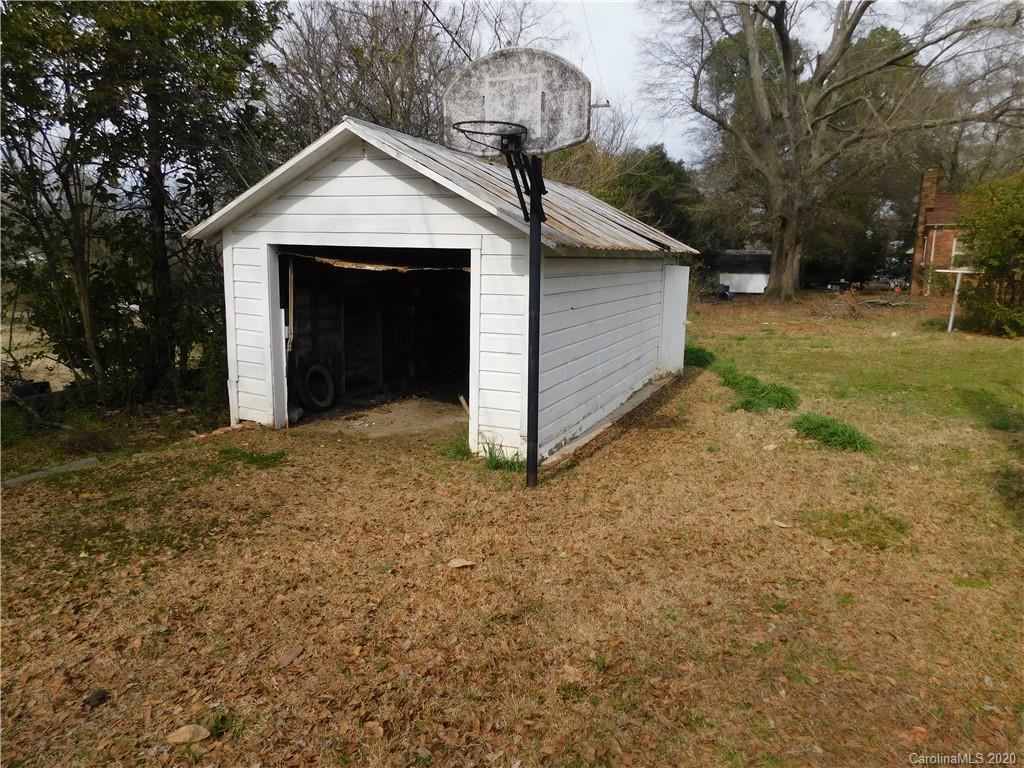 1382 Springdale Road, Unit 7 Lancaster, SC 29720 - Photo 31 of 31 a view of a house with a yard and garage