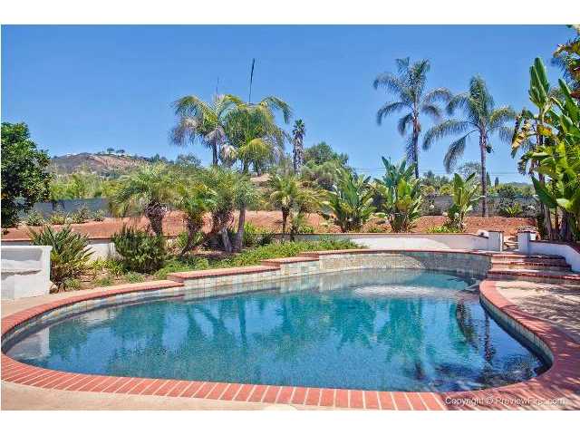 3426 Royal Road Vista, CA 92084 - Photo 17 of 24 Tropoical landscaping and lovely views of the hills beyond