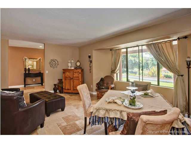 3426 Royal Road Vista, CA 92084 - Photo 20 of 24 Step down living room with lots of light from the large front window