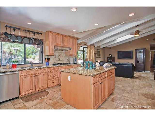 3426 Royal Road Vista, CA 92084 - Photo 7 of 24 Upgraded flooring expands from the kitchen to the family room