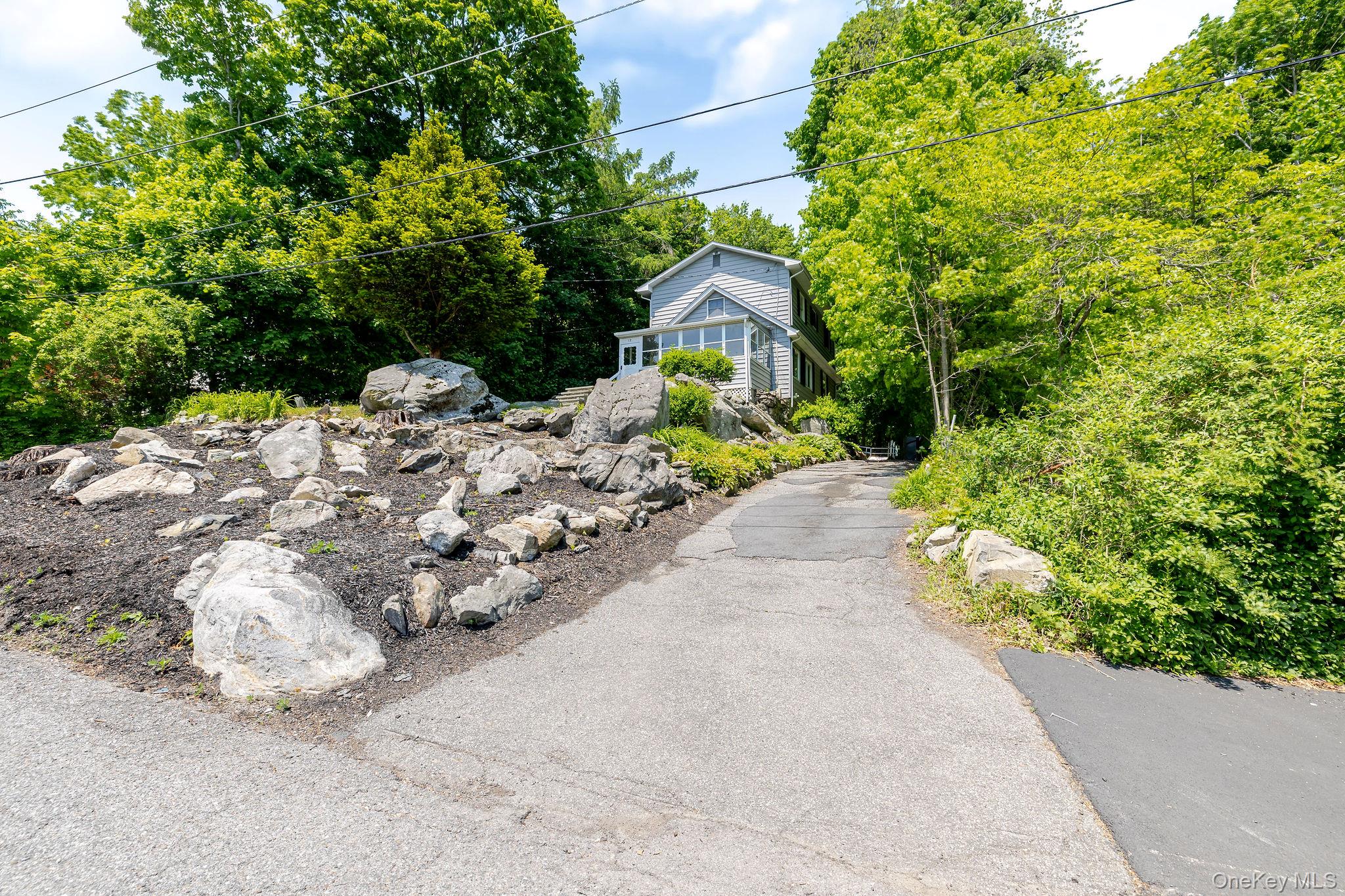 12 Bradhurst Road Carmel, NY 10512 - Photo 3 of 28 a view of a house with a street