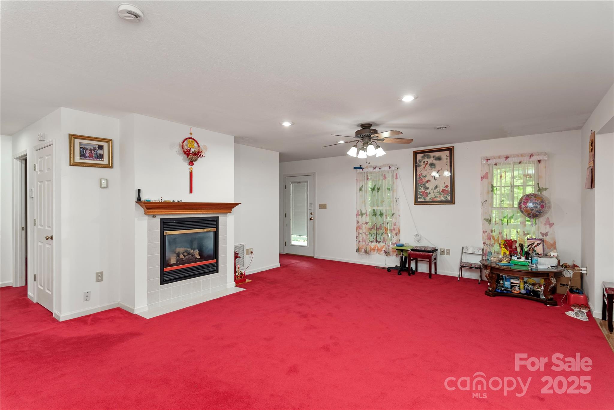 98 Choga Ridge Whittier, NC 28789 - Photo 6 of 28 a living room with furniture and a fireplace