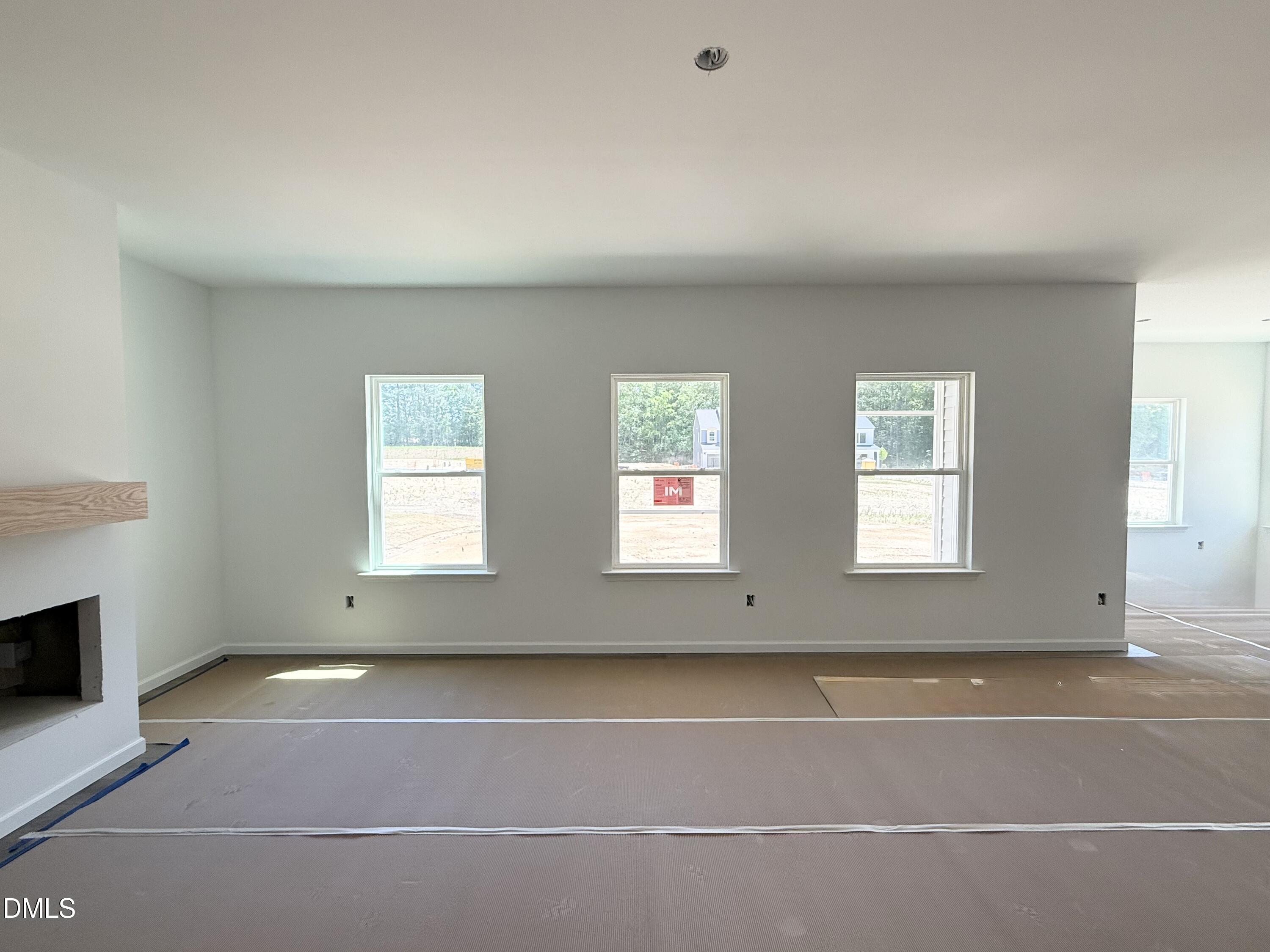 941 Fetching Place, Unit 370 Rolesville, NC 27571 - Photo 11 of 24 an empty room with windows