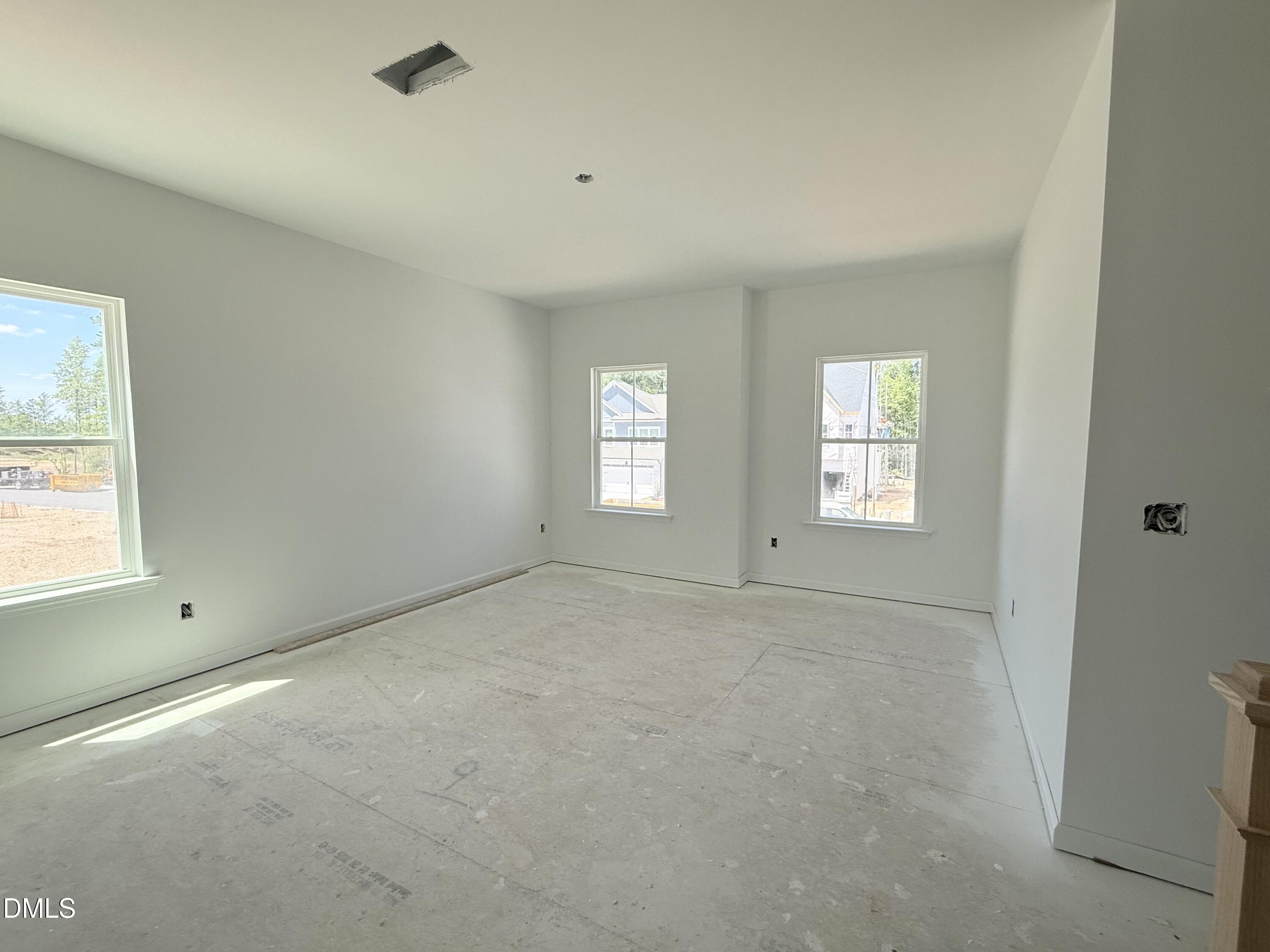 941 Fetching Place, Unit 370 Rolesville, NC 27571 - Photo 14 of 24 an empty room with windows