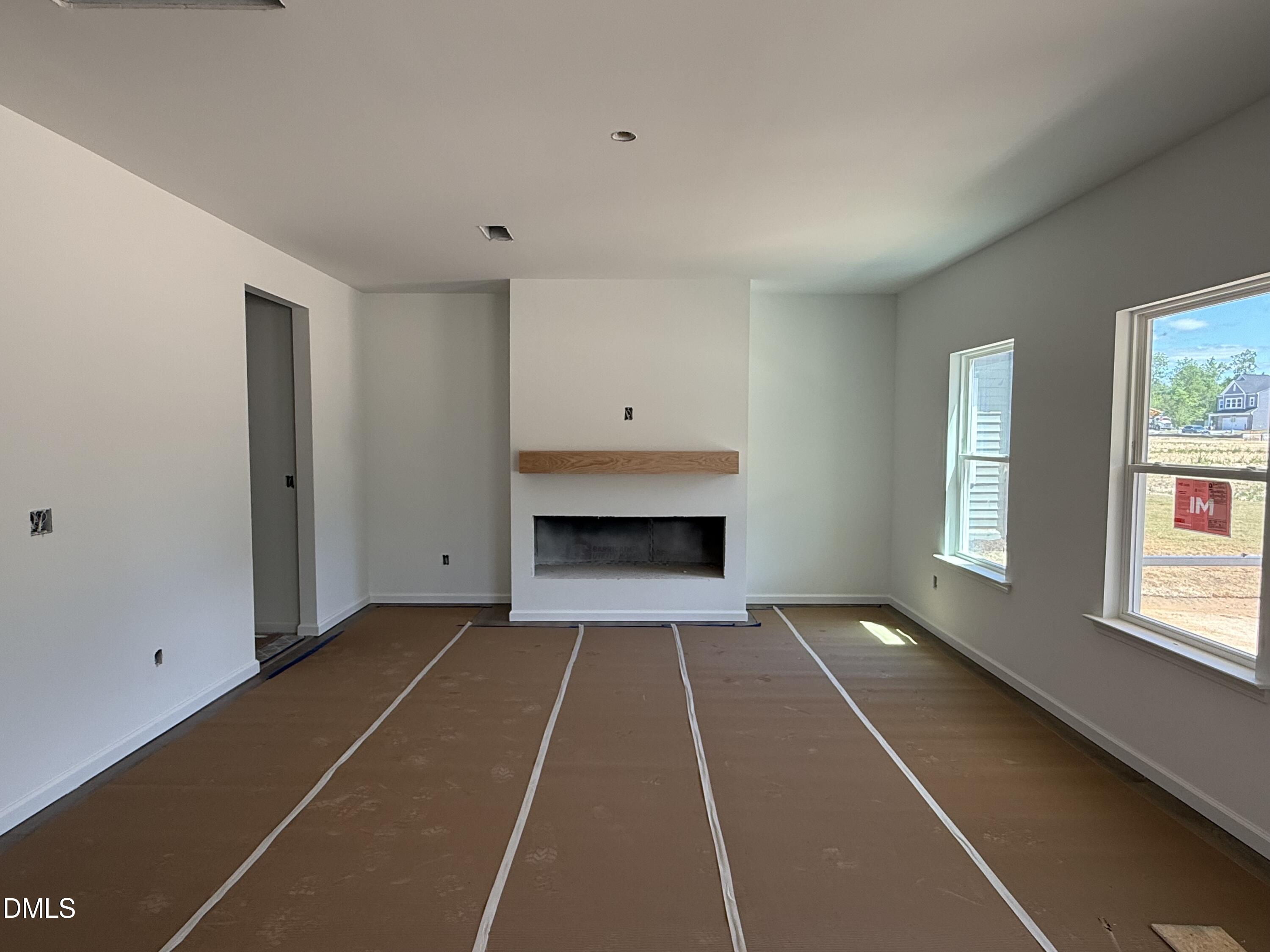 941 Fetching Place, Unit 370 Rolesville, NC 27571 - Photo 10 of 24 a view of an empty room with a window