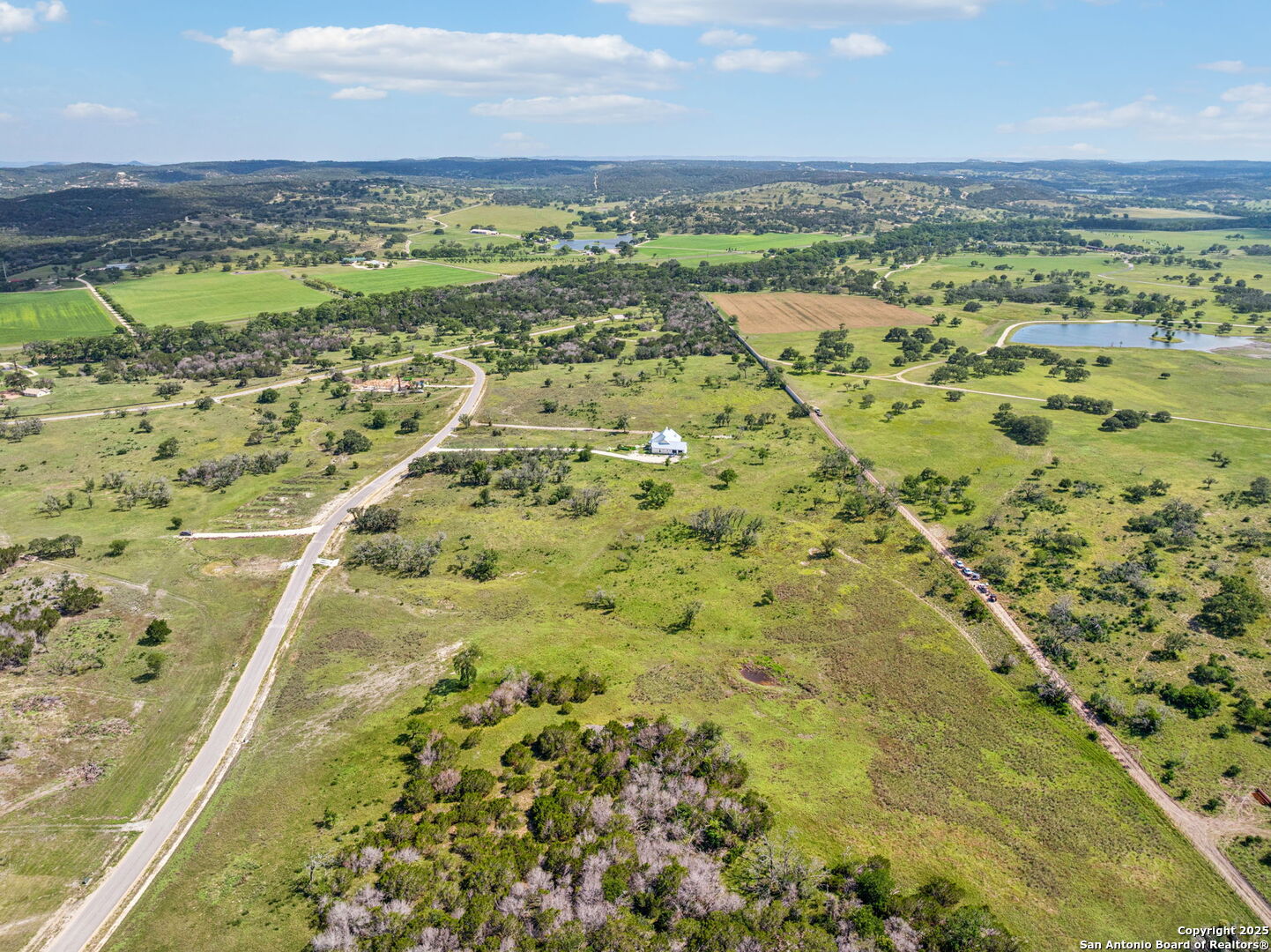 0 Seep Springs Drive Center Point, TX 78010 - Photo 20 of 50 a view of a city with an ocean beach