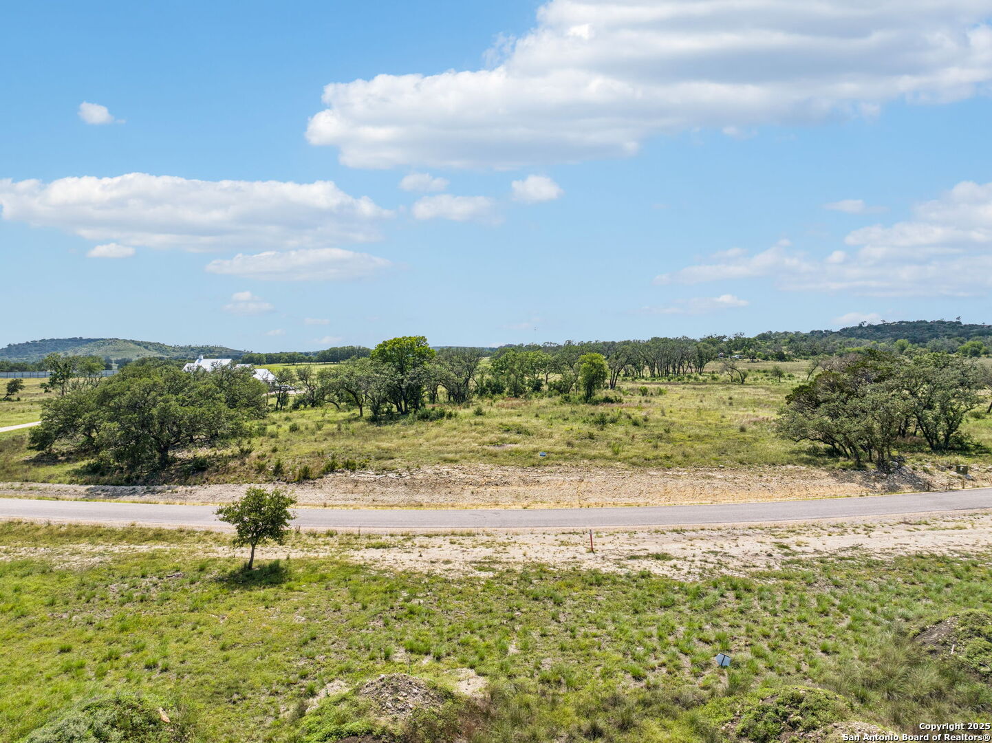0 Seep Springs Drive Center Point, TX 78010 - Photo 24 of 50 a view of a lake with a house