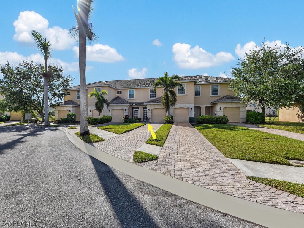 11740 Eros Road Lehigh Acres, FL 33971 - Photo 1 of 30 a view of a house with outdoor space and street view