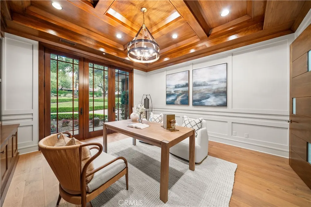 930 Fallen Leaf Road Arcadia, CA 91006 - Photo 12 of 63 a dining room with furniture a chandelier and wooden floor
