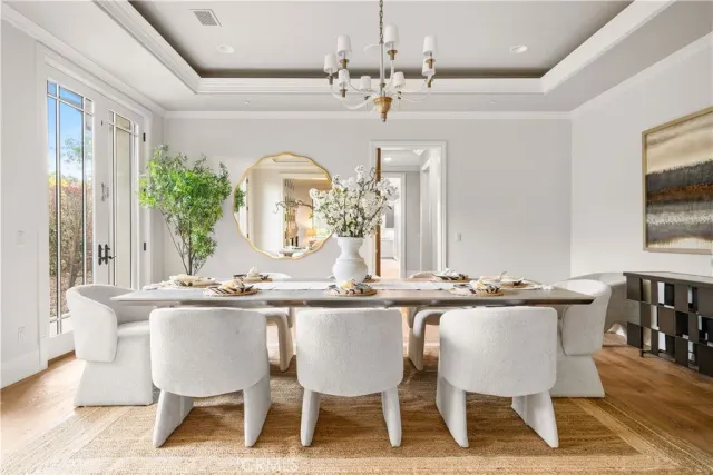 a large kitchen with stainless steel appliances kitchen island a large counter tops a sink and a counter top space