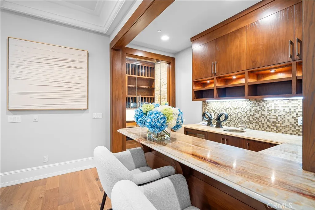 930 Fallen Leaf Road Arcadia, CA 91006 - Photo 28 of 63 a room with a table chairs and wooden floor