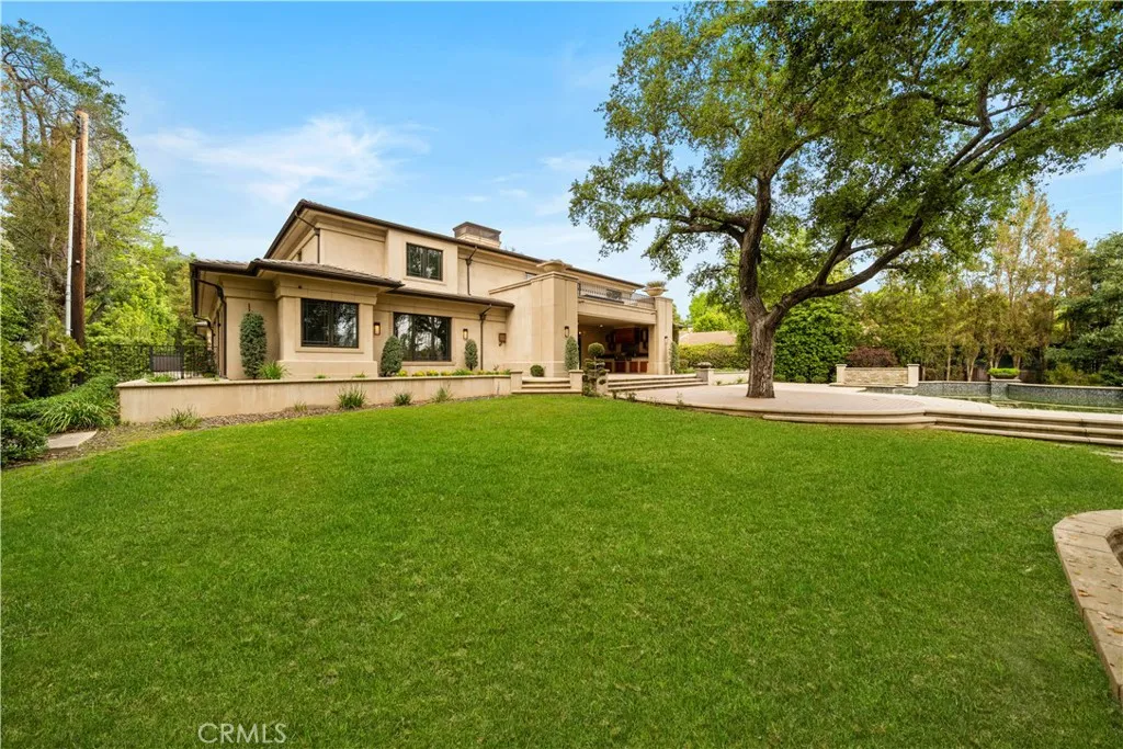 930 Fallen Leaf Road Arcadia, CA 91006 - Photo 31 of 63 a front view of house with a garden and trees