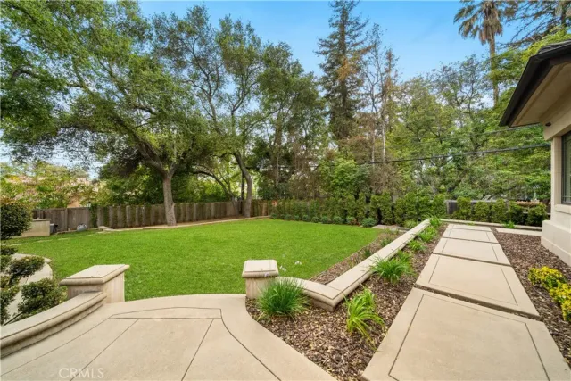 a utility room with sink dryer and washer