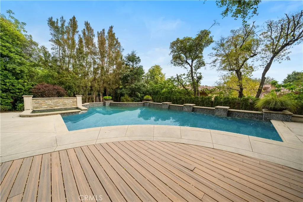 930 Fallen Leaf Road Arcadia, CA 91006 - Photo 33 of 63 a view of a patio with table and chairs with wooden floor and fence