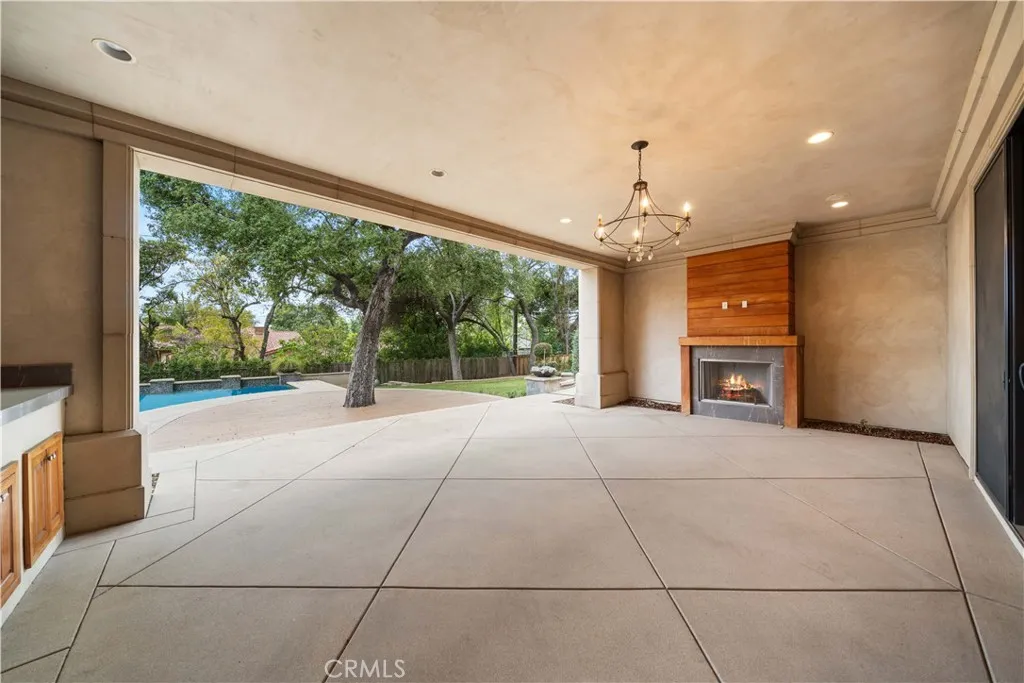 930 Fallen Leaf Road Arcadia, CA 91006 - Photo 35 of 63 a living room with furniture and a flat screen tv