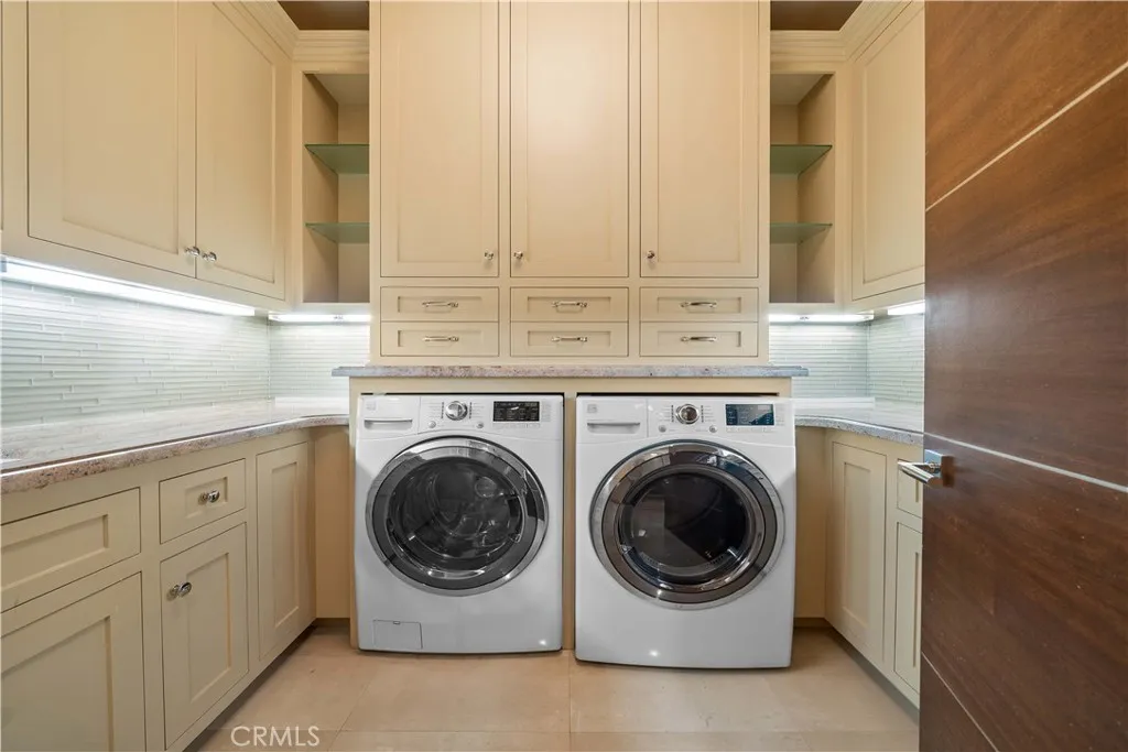 930 Fallen Leaf Road Arcadia, CA 91006 - Photo 41 of 63 a utility room with sink dryer and washer