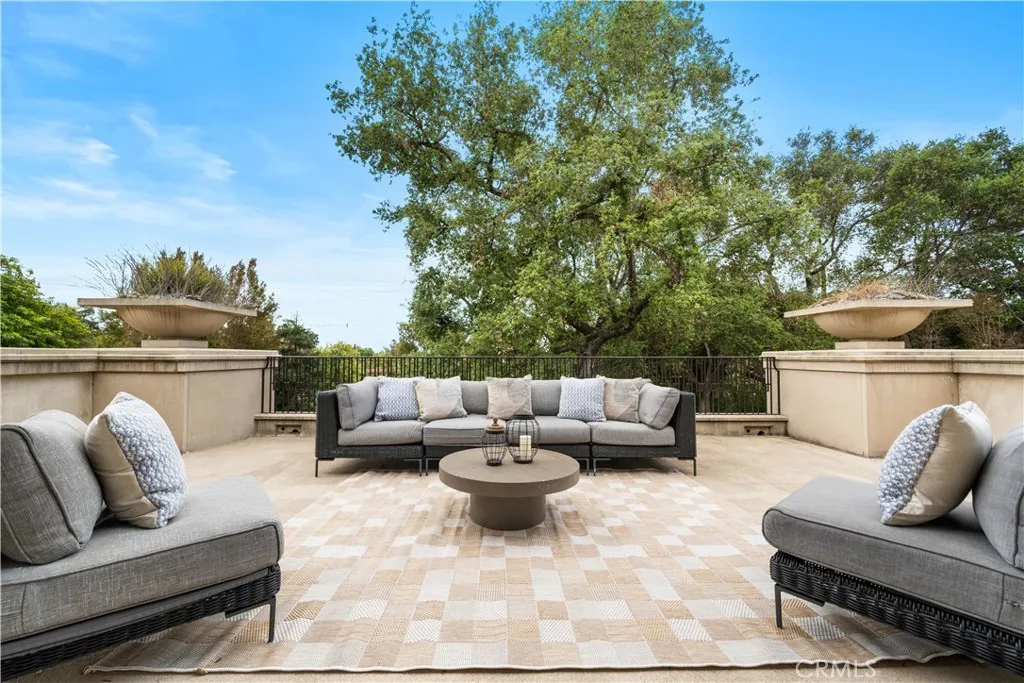 930 Fallen Leaf Road Arcadia, CA 91006 - Photo 57 of 63 a view of a patio with couches and potted plants