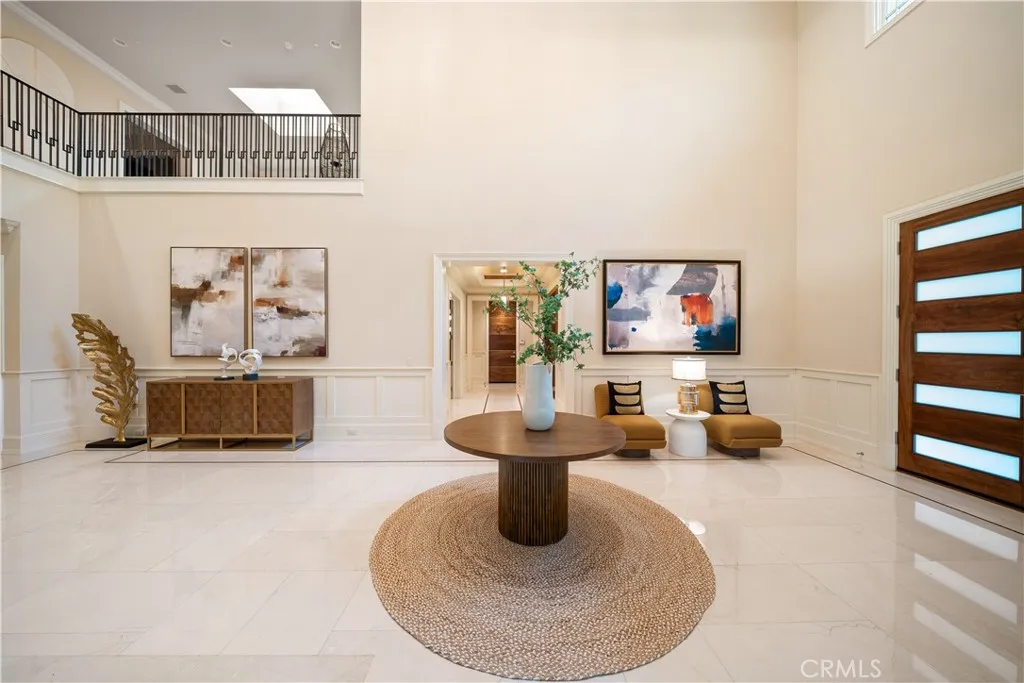 930 Fallen Leaf Road Arcadia, CA 91006 - Photo 7 of 63 a living room with furniture and a floor to ceiling window