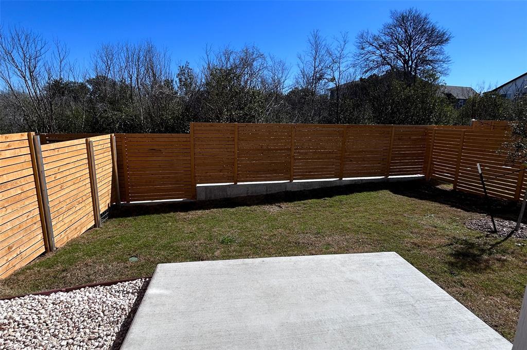 1191 Sarabeth Way Austin, TX 78721 - Photo 12 of 13 a view of a backyard