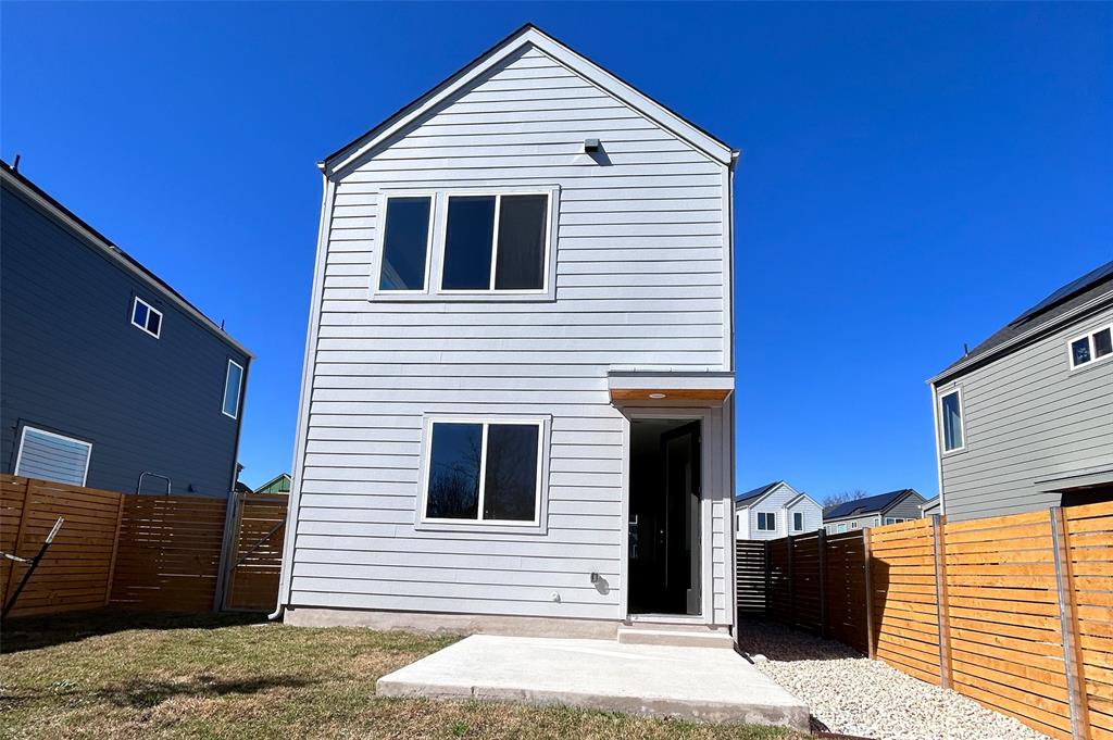 1191 Sarabeth Way Austin, TX 78721 - Photo 13 of 13 a view of a house with a balcony