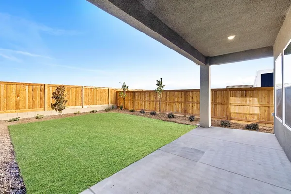 a view of a porch with a big yard