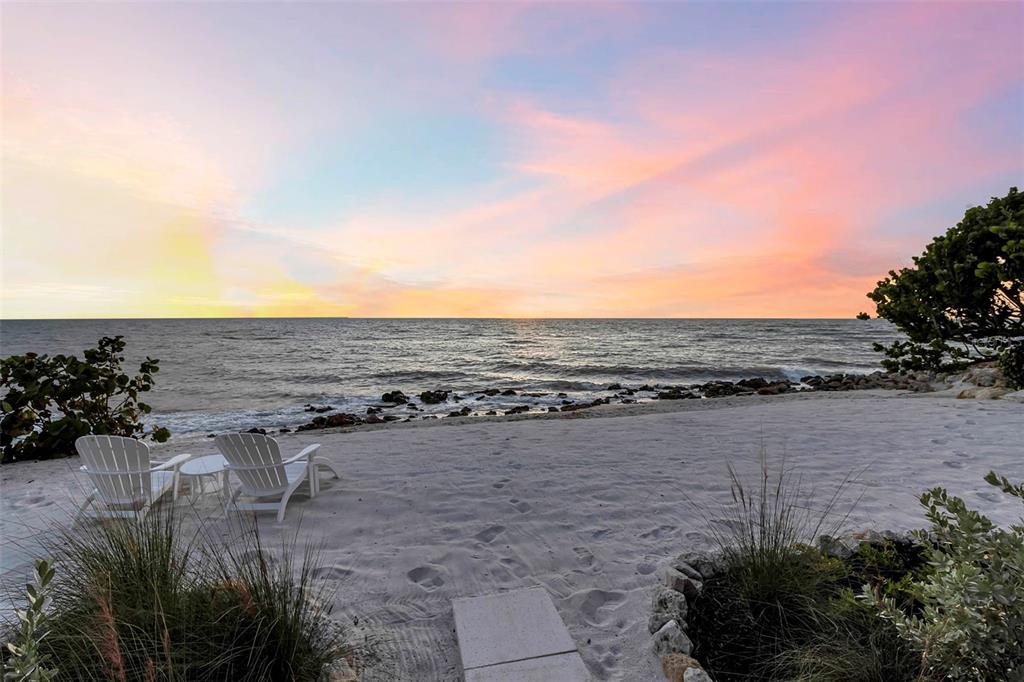 121 North Casey Key Road Osprey, FL 34229 - Photo 49 of 63 a view of a lake with nearby beach