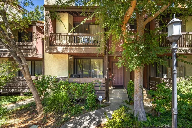 front view of a house with a small yard