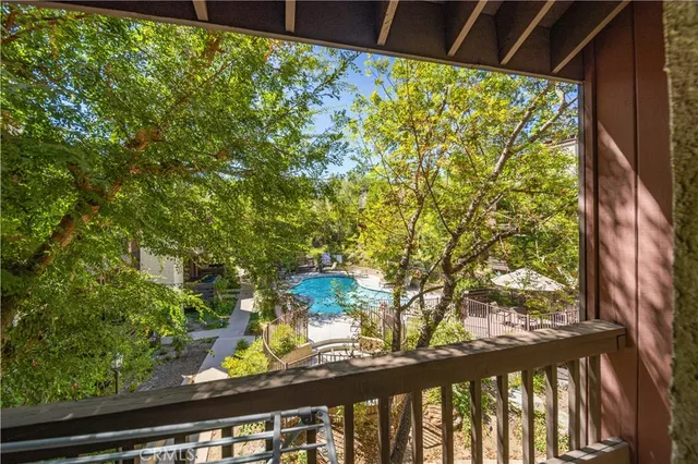 a view of a street from a balcony