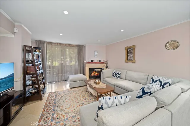 a living room with furniture or couch and a bookshelf