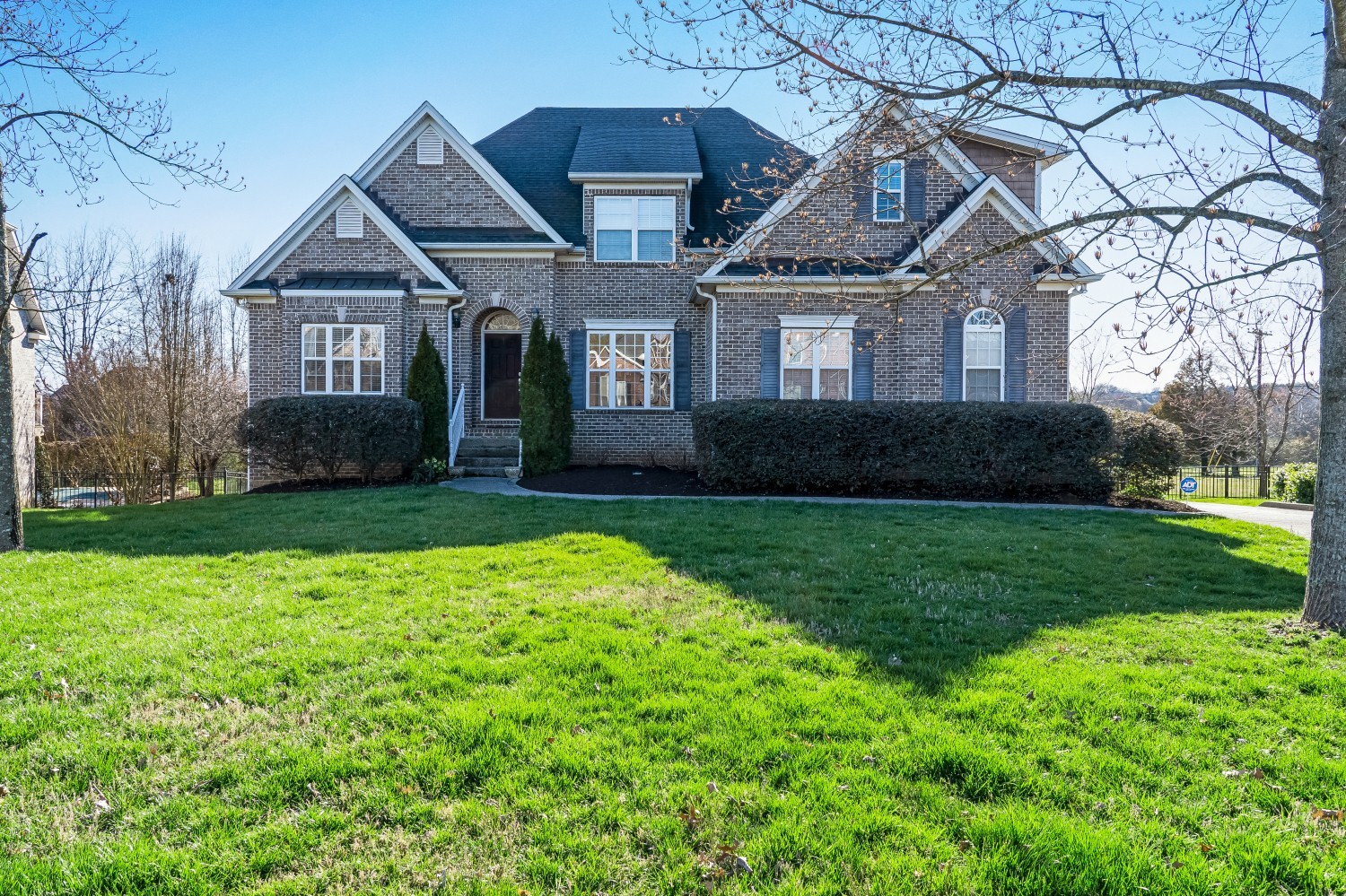 1623 Fair House Road Spring Hill, TN 37174 - Photo 2 of 35 a front view of a house with a yard