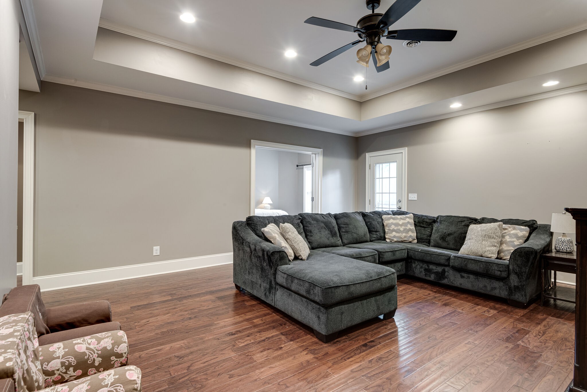 1623 Fair House Road Spring Hill, TN 37174 - Photo 26 of 35 a living room with furniture and a ceiling fan