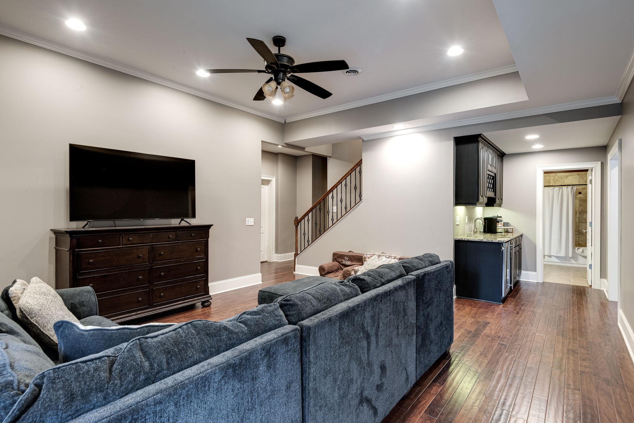 1623 Fair House Road Spring Hill, TN 37174 - Photo 27 of 35 a living room with furniture and a flat screen tv