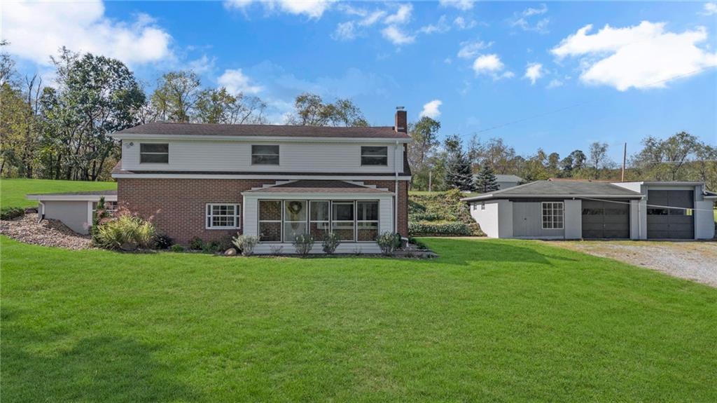 1406 Riverview Road Crescent, PA 15046 - Photo 2 of 40 Inviting sunporch and situated on just under 1 acre.
