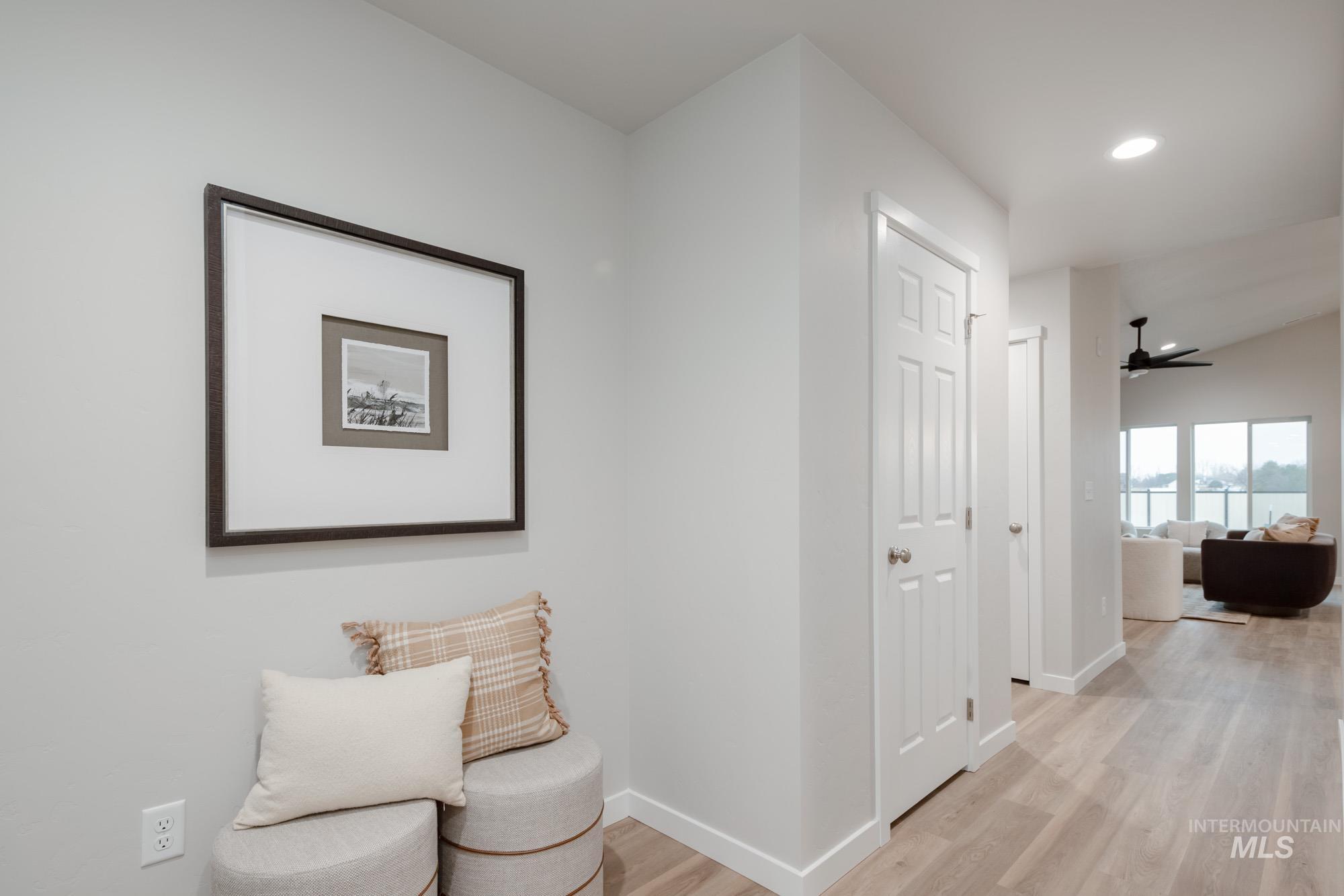 1760 West Unforgettable Street Meridian, ID 83642 - Photo 25 of 26 Sitting room with ceiling fan, light wood-style flooring, and recessed lighting