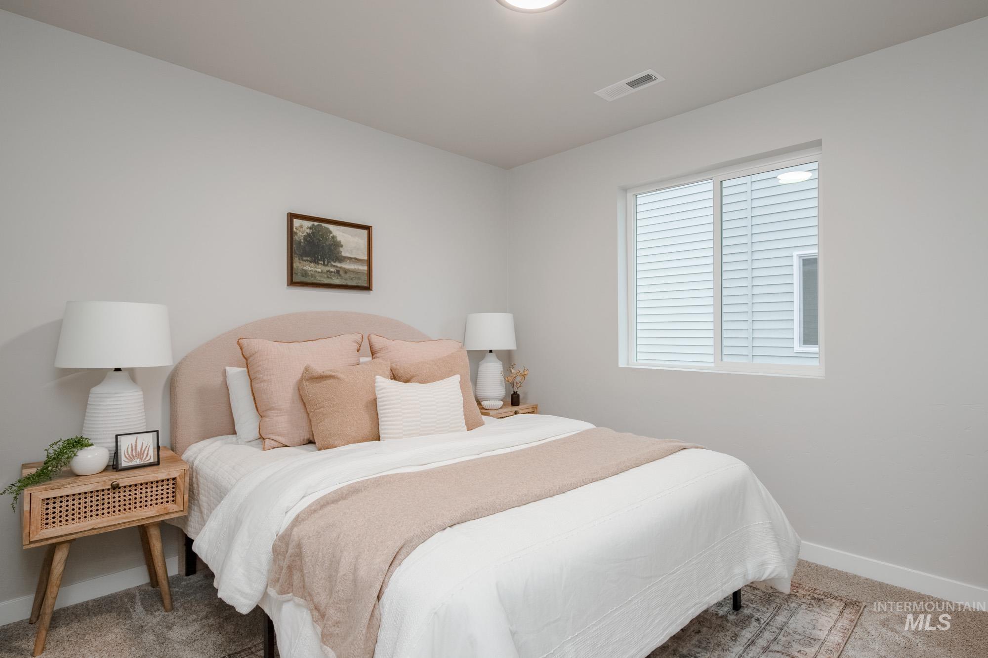 1760 West Unforgettable Street Meridian, ID 83642 - Photo 6 of 26 Carpeted bedroom with baseboards