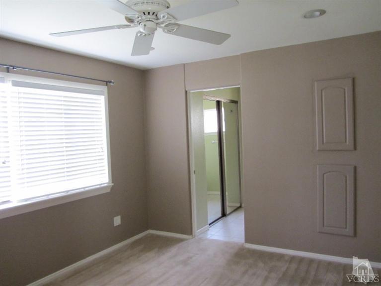 3192 Travis Avenue Simi Valley, CA 93063 - Photo 16 of 36 wooden floor in an empty room with a window