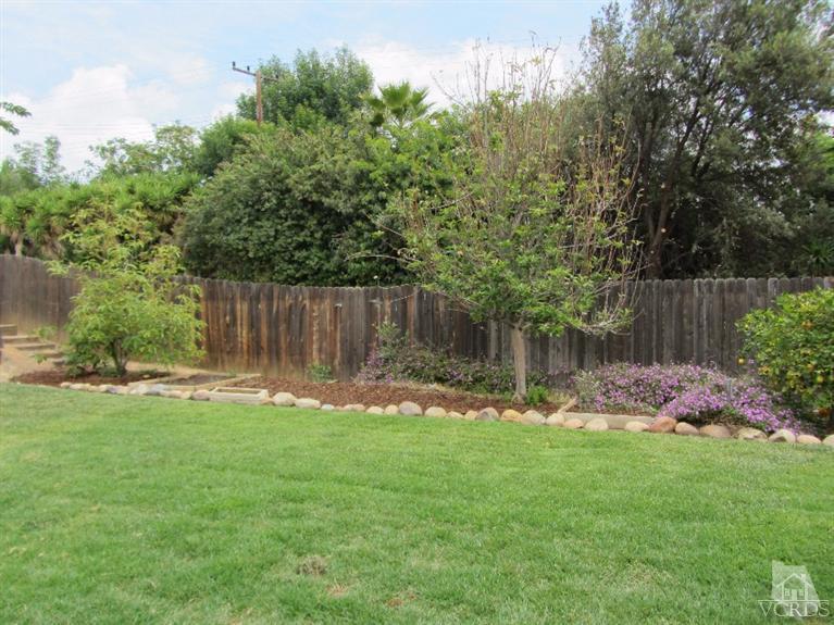 3192 Travis Avenue Simi Valley, CA 93063 - Photo 33 of 36 a backyard of a house with lots of green space