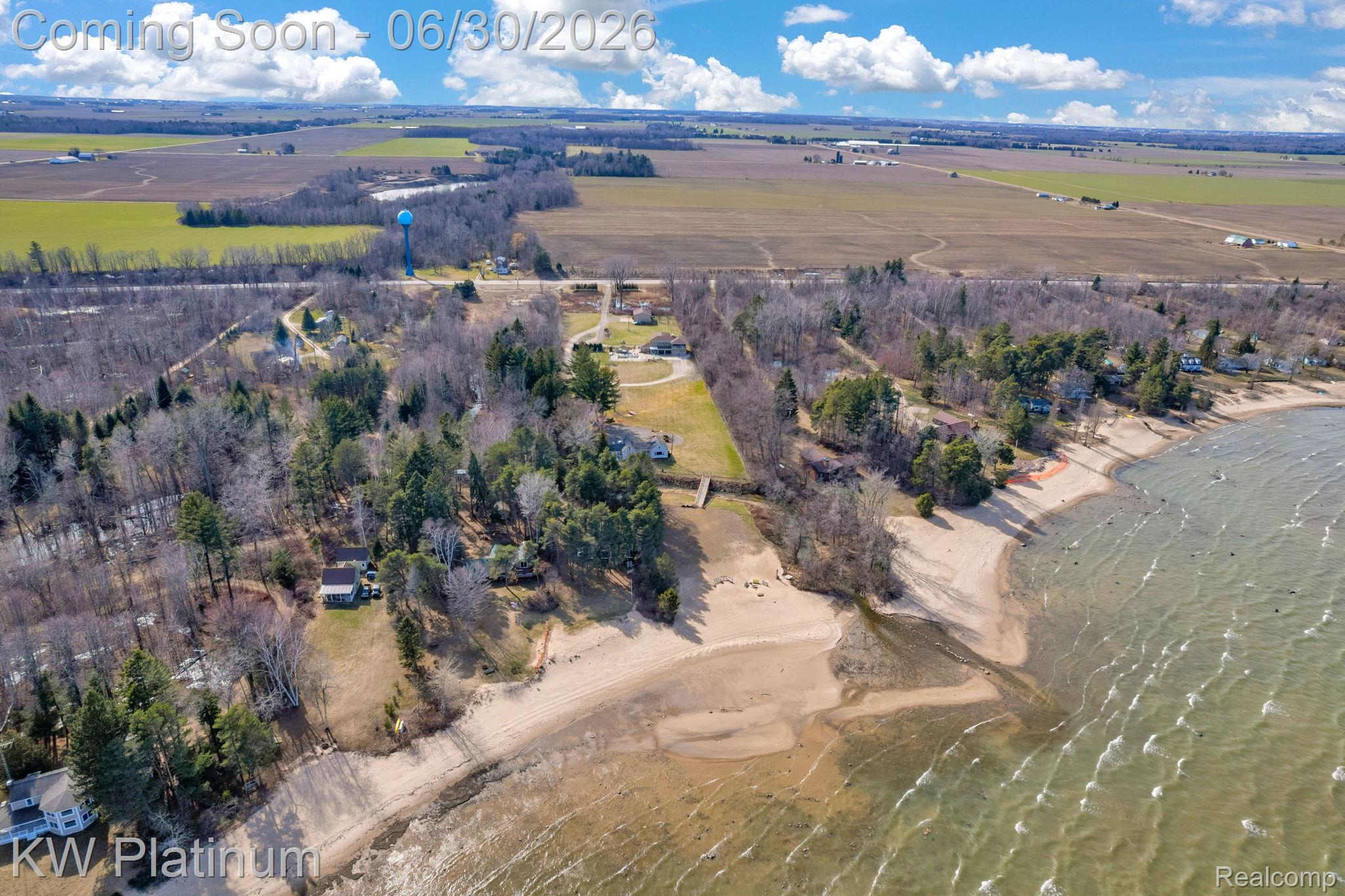 2235 South Lake Shore Road Harbor Beach, MI 48441 - Photo 99 of 99 Aerial perspective showcasing waterfront properties with sandy shorelines and mature tree coverage