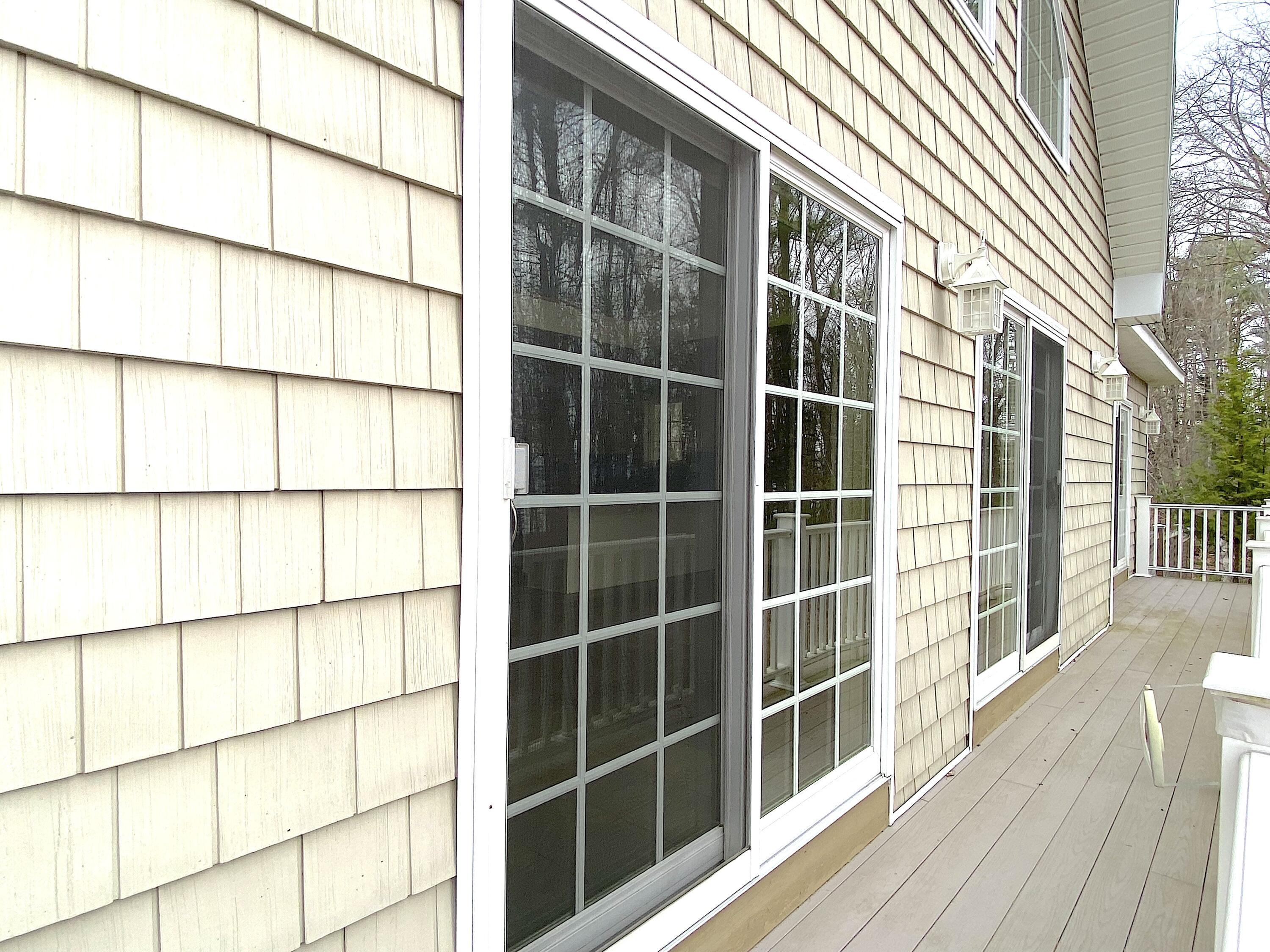 625 Shore Road Northport, ME 04849 - Photo 6 of 35 Sliders to Wrap-around Deck