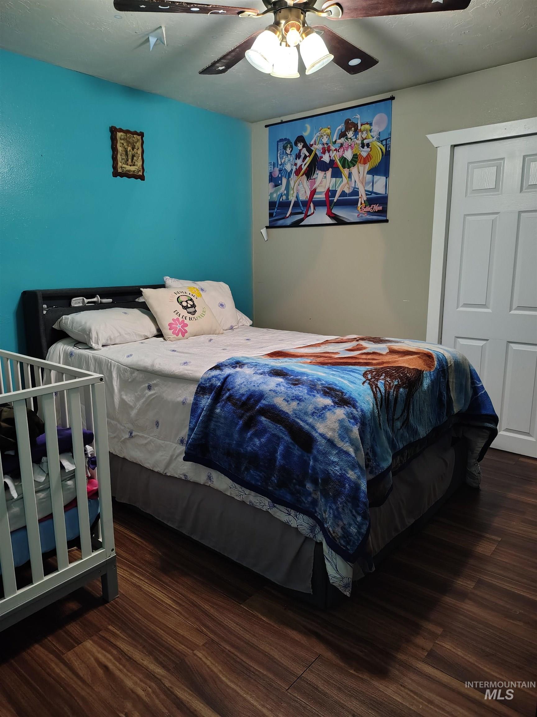 820 Meadows Drive Twin Falls, ID 83301 - Photo 8 of 18 Bedroom with dark wood finished floors and a ceiling fan