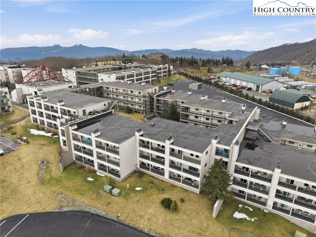 301 Pinnacle Inn Road, Unit 3301 Beech Mountain, NC 28604 - Photo 29 of 34 a view of a city with tall buildings