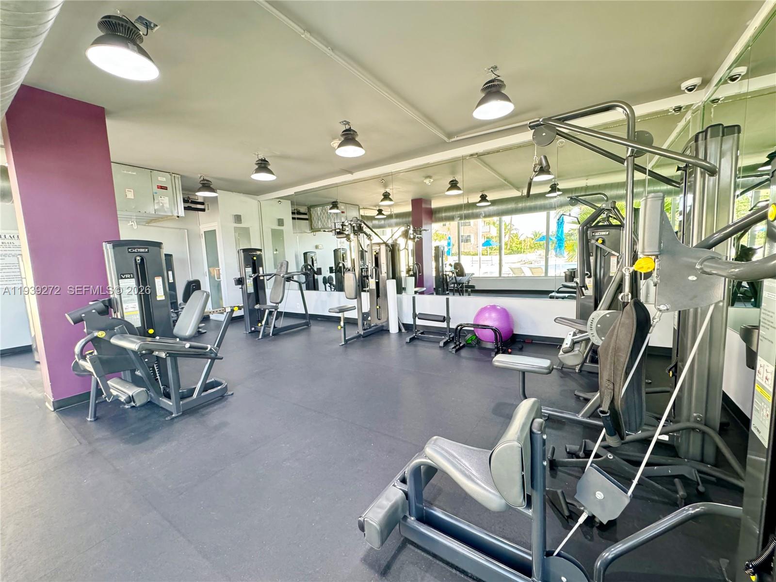 100 Lincoln Road, Unit 1230 Miami Beach, FL 33139 - Photo 28 of 38 a view of a room with gym equipment