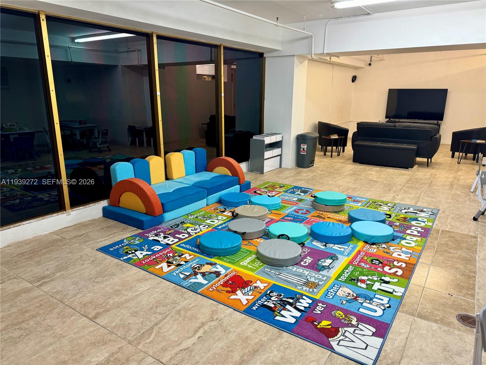100 Lincoln Road, Unit 1230 Miami Beach, FL 33139 - Photo 29 of 44 a living room filled with furniture and a table