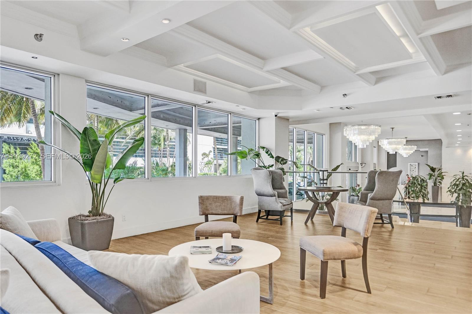100 Lincoln Road, Unit 1230 Miami Beach, FL 33139 - Photo 36 of 44 a living room with furniture and a large window
