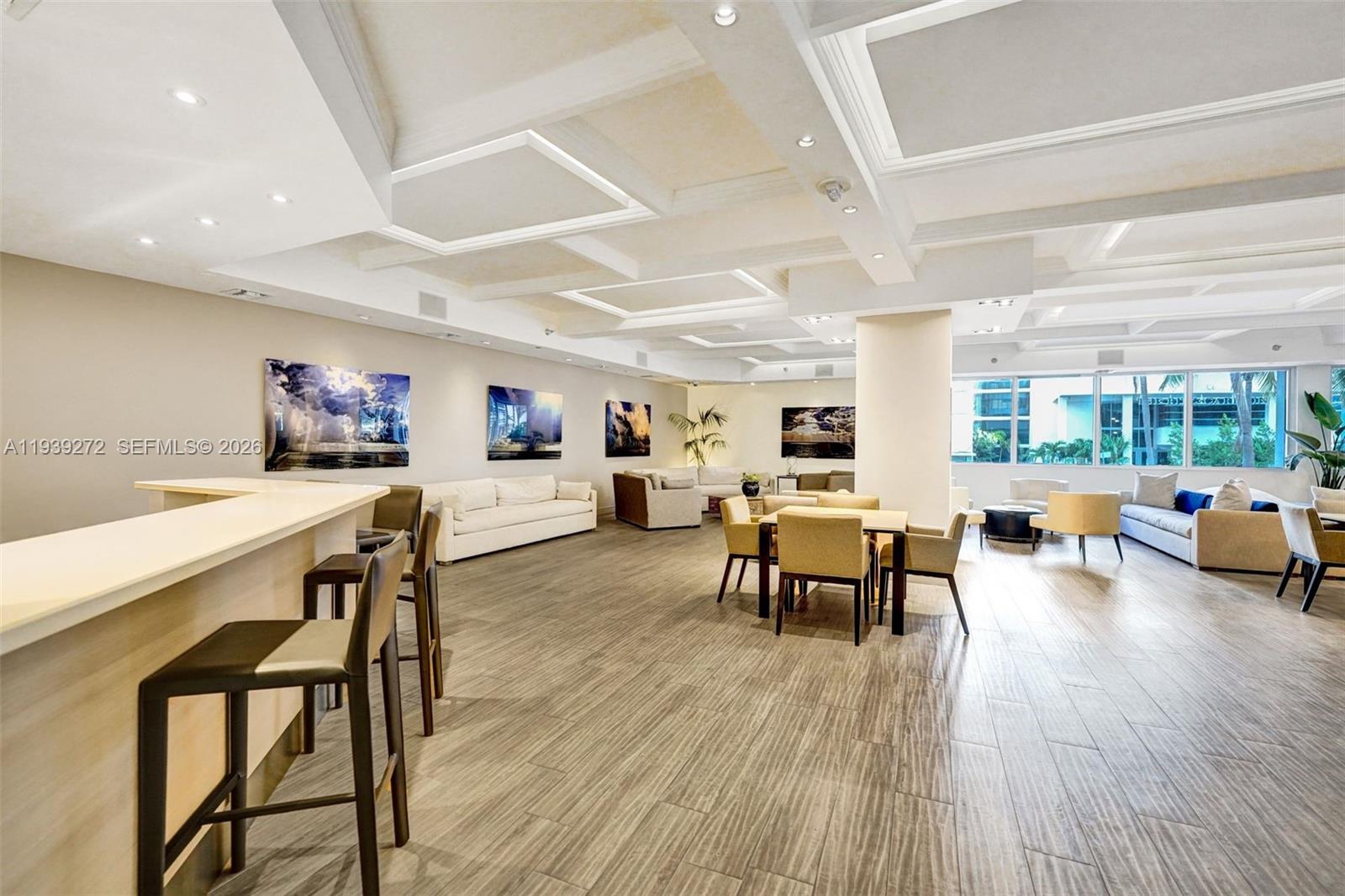 100 Lincoln Road, Unit 1230 Miami Beach, FL 33139 - Photo 37 of 44 a living room with furniture and a wooden floor