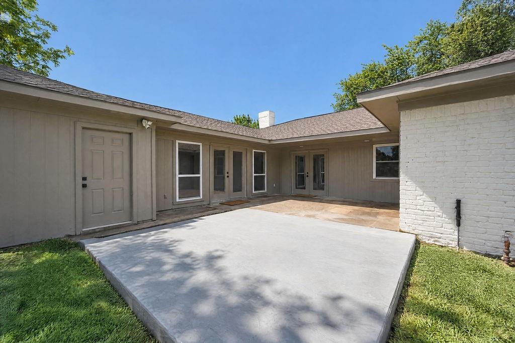 1904 Apollo Road Richardson, TX 75081 - Photo 37 of 40 Expansive concrete patio with an additional stone patio area