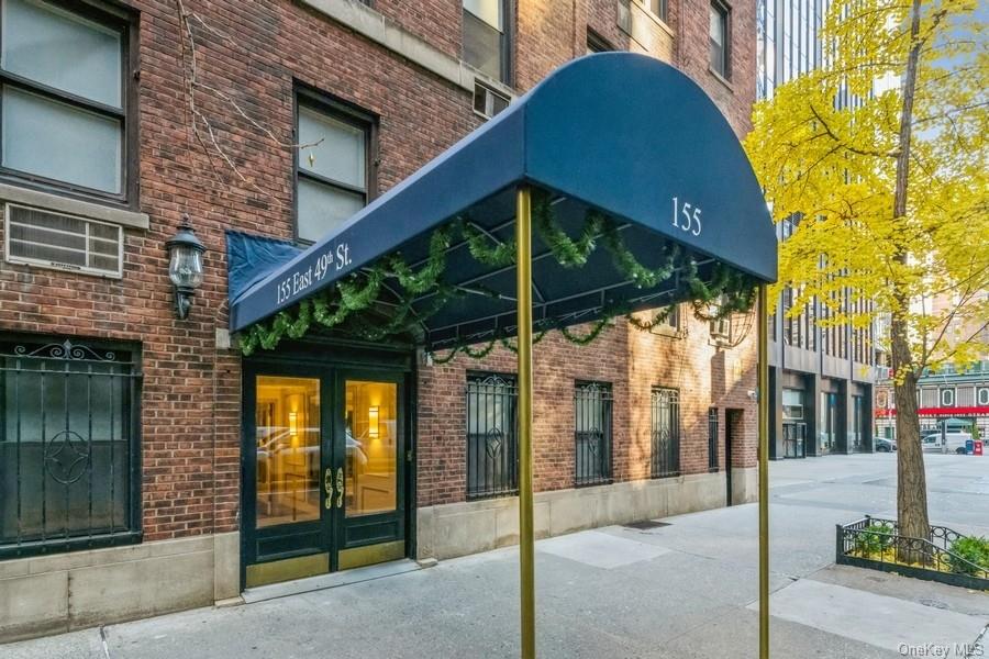155 East 49th Street, Unit 5C Manhattan, NY 10022 - Photo 1 of 2 a view of a house with a porch